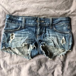 Lowrise cutoff shorts, embroidered pocket detail